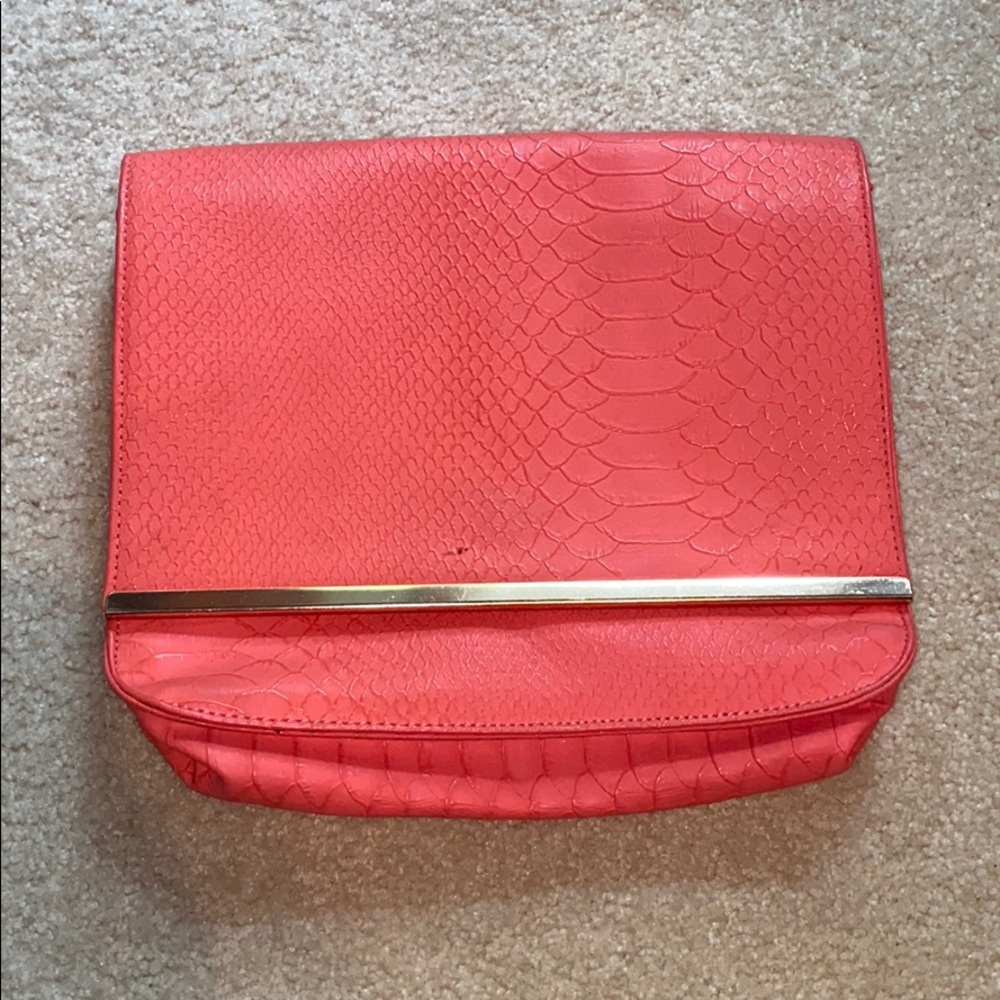 CHARMING CHARLIE coral clutch